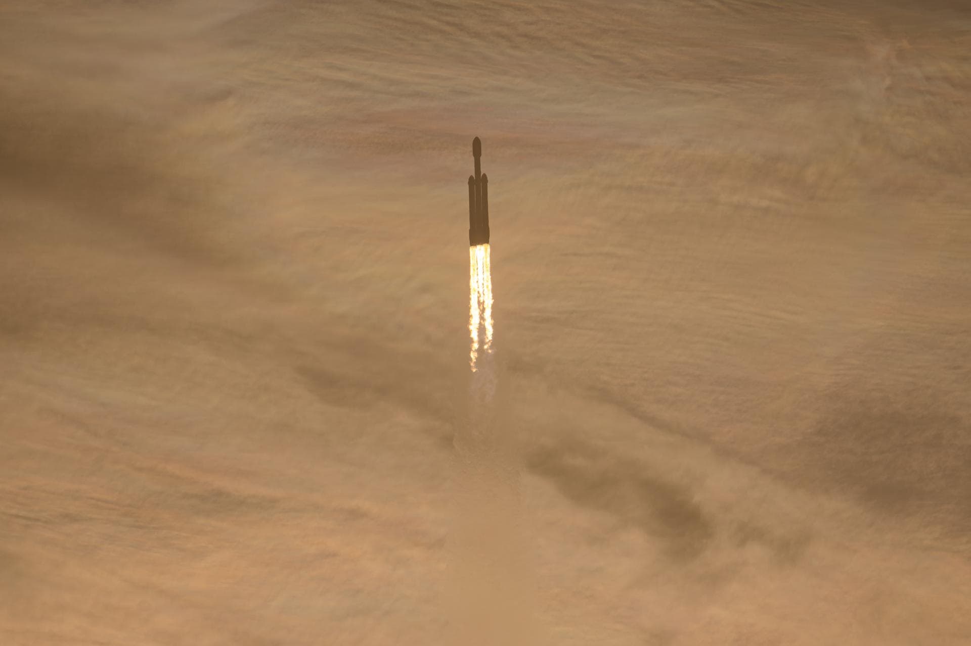 A SpaceX Falcon Heavy carrying NASA's Nancy Grace Roman Space Telescope climbs through golden clouds after launch